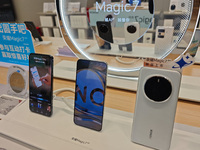 The newly released Maigic7 mobile phones are displayed at the Honor Mobile phone store in Shanghai, China, on November 13, 2024. (