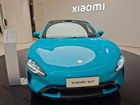 A Xiaomi SU7 car is displayed inside a Xiaomi store in Shanghai, China, on November 13, 2024. (