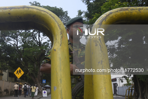 A Sri Lankan STF soldier guards a distribution center a day before the Parliamentary Election in Colombo, Sri Lanka, on November 13, 2024. 