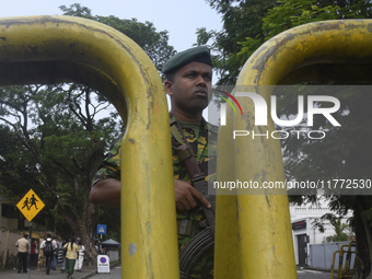 A Sri Lankan STF soldier guards a distribution center a day before the Parliamentary Election in Colombo, Sri Lanka, on November 13, 2024. (