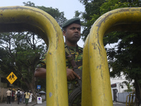 A Sri Lankan STF soldier guards a distribution center a day before the Parliamentary Election in Colombo, Sri Lanka, on November 13, 2024. (