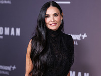 Demi Moore wearing Erdem arrives at the Los Angeles Premiere Of Paramount+'s Original Series 'Landman' Season 1 held at the Paramount Theatr...