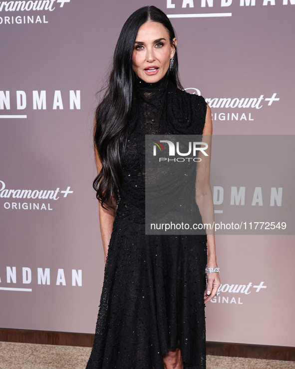 Demi Moore wearing Erdem arrives at the Los Angeles Premiere Of Paramount+'s Original Series 'Landman' Season 1 held at the Paramount Theatr...