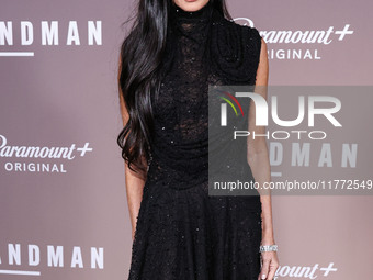 Demi Moore wearing Erdem arrives at the Los Angeles Premiere Of Paramount+'s Original Series 'Landman' Season 1 held at the Paramount Theatr...