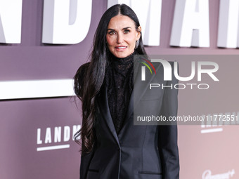 Demi Moore wearing Erdem arrives at the Los Angeles Premiere Of Paramount+'s Original Series 'Landman' Season 1 held at the Paramount Theatr...