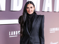 Demi Moore wearing Erdem arrives at the Los Angeles Premiere Of Paramount+'s Original Series 'Landman' Season 1 held at the Paramount Theatr...