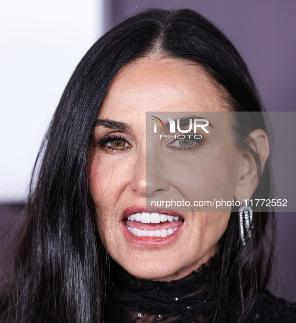 Demi Moore wearing Erdem arrives at the Los Angeles Premiere Of Paramount+'s Original Series 'Landman' Season 1 held at the Paramount Theatr...