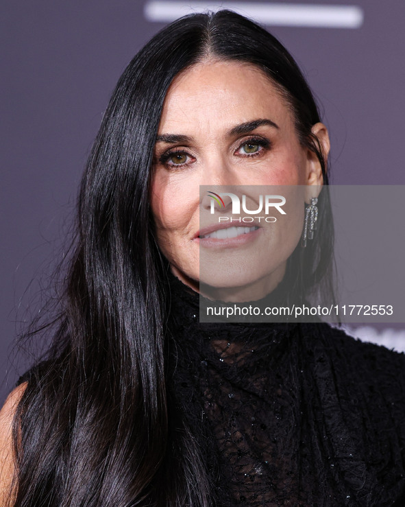 Demi Moore wearing Erdem arrives at the Los Angeles Premiere Of Paramount+'s Original Series 'Landman' Season 1 held at the Paramount Theatr...