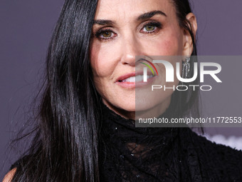 Demi Moore wearing Erdem arrives at the Los Angeles Premiere Of Paramount+'s Original Series 'Landman' Season 1 held at the Paramount Theatr...