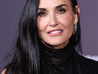 Demi Moore wearing Erdem arrives at the Los Angeles Premiere Of Paramount+'s Original Series 'Landman' Season 1 held at the Paramount Theatr...