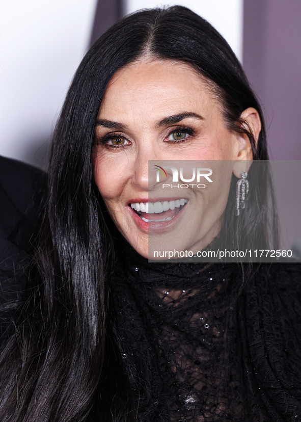 Demi Moore wearing Erdem arrives at the Los Angeles Premiere Of Paramount+'s Original Series 'Landman' Season 1 held at the Paramount Theatr...