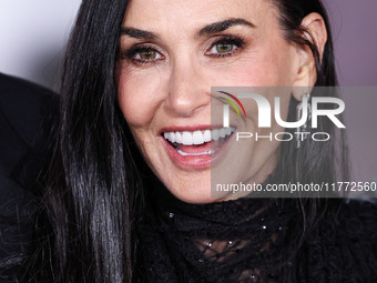 Demi Moore wearing Erdem arrives at the Los Angeles Premiere Of Paramount+'s Original Series 'Landman' Season 1 held at the Paramount Theatr...