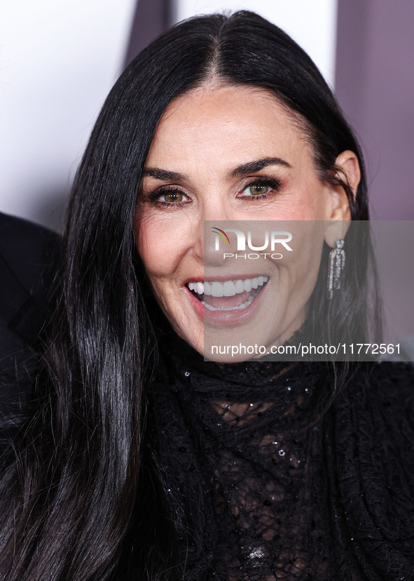 Demi Moore wearing Erdem arrives at the Los Angeles Premiere Of Paramount+'s Original Series 'Landman' Season 1 held at the Paramount Theatr...