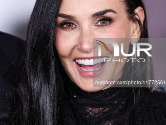 Demi Moore wearing Erdem arrives at the Los Angeles Premiere Of Paramount+'s Original Series 'Landman' Season 1 held at the Paramount Theatr...