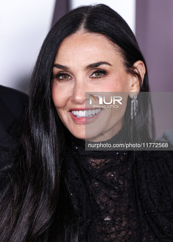 Demi Moore wearing Erdem arrives at the Los Angeles Premiere Of Paramount+'s Original Series 'Landman' Season 1 held at the Paramount Theatr...