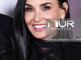 Demi Moore wearing Erdem arrives at the Los Angeles Premiere Of Paramount+'s Original Series 'Landman' Season 1 held at the Paramount Theatr...