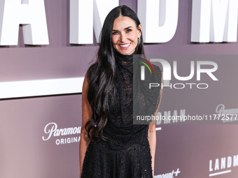 Demi Moore wearing Erdem arrives at the Los Angeles Premiere Of Paramount+'s Original Series 'Landman' Season 1 held at the Paramount Theatr...