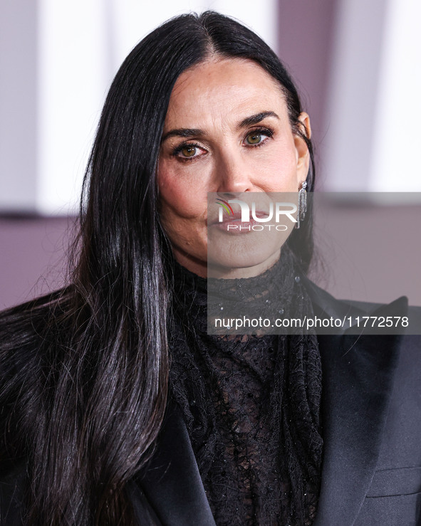 Demi Moore wearing Erdem arrives at the Los Angeles Premiere Of Paramount+'s Original Series 'Landman' Season 1 held at the Paramount Theatr...