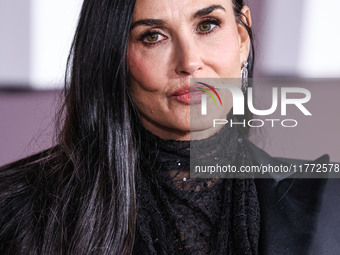 Demi Moore wearing Erdem arrives at the Los Angeles Premiere Of Paramount+'s Original Series 'Landman' Season 1 held at the Paramount Theatr...