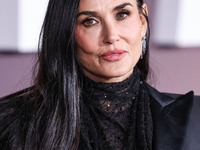 Demi Moore wearing Erdem arrives at the Los Angeles Premiere Of Paramount+'s Original Series 'Landman' Season 1 held at the Paramount Theatr...