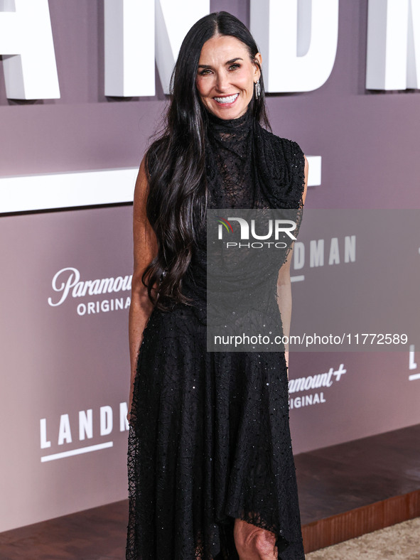 Demi Moore wearing Erdem arrives at the Los Angeles Premiere Of Paramount+'s Original Series 'Landman' Season 1 held at the Paramount Theatr...