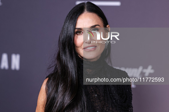 Demi Moore wearing Erdem arrives at the Los Angeles Premiere Of Paramount+'s Original Series 'Landman' Season 1 held at the Paramount Theatr...