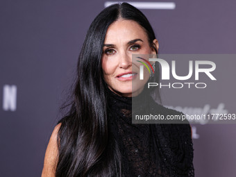 Demi Moore wearing Erdem arrives at the Los Angeles Premiere Of Paramount+'s Original Series 'Landman' Season 1 held at the Paramount Theatr...