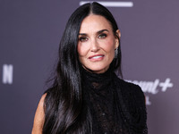 Demi Moore wearing Erdem arrives at the Los Angeles Premiere Of Paramount+'s Original Series 'Landman' Season 1 held at the Paramount Theatr...