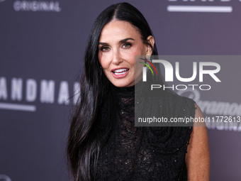 Demi Moore wearing Erdem arrives at the Los Angeles Premiere Of Paramount+'s Original Series 'Landman' Season 1 held at the Paramount Theatr...