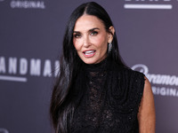 Demi Moore wearing Erdem arrives at the Los Angeles Premiere Of Paramount+'s Original Series 'Landman' Season 1 held at the Paramount Theatr...