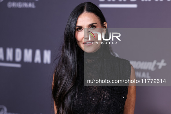 Demi Moore wearing Erdem arrives at the Los Angeles Premiere Of Paramount+'s Original Series 'Landman' Season 1 held at the Paramount Theatr...