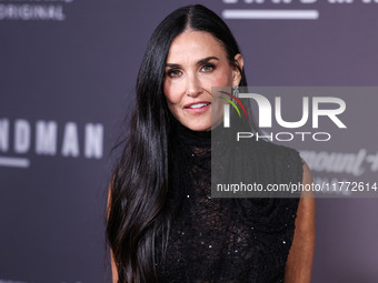 Demi Moore wearing Erdem arrives at the Los Angeles Premiere Of Paramount+'s Original Series 'Landman' Season 1 held at the Paramount Theatr...