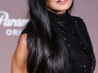 Demi Moore wearing Erdem arrives at the Los Angeles Premiere Of Paramount+'s Original Series 'Landman' Season 1 held at the Paramount Theatr...