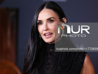 Demi Moore wearing Erdem arrives at the Los Angeles Premiere Of Paramount+'s Original Series 'Landman' Season 1 held at the Paramount Theatr...