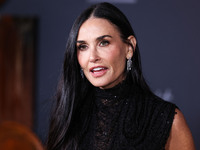 Demi Moore wearing Erdem arrives at the Los Angeles Premiere Of Paramount+'s Original Series 'Landman' Season 1 held at the Paramount Theatr...