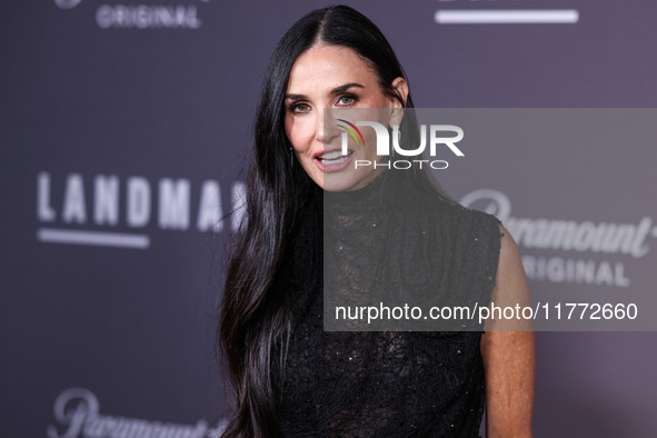 Demi Moore wearing Erdem arrives at the Los Angeles Premiere Of Paramount+'s Original Series 'Landman' Season 1 held at the Paramount Theatr...