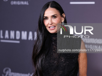 Demi Moore wearing Erdem arrives at the Los Angeles Premiere Of Paramount+'s Original Series 'Landman' Season 1 held at the Paramount Theatr...