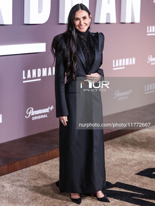 Demi Moore wearing Erdem arrives at the Los Angeles Premiere Of Paramount+'s Original Series 'Landman' Season 1 held at the Paramount Theatr...