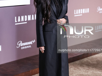 Demi Moore wearing Erdem arrives at the Los Angeles Premiere Of Paramount+'s Original Series 'Landman' Season 1 held at the Paramount Theatr...