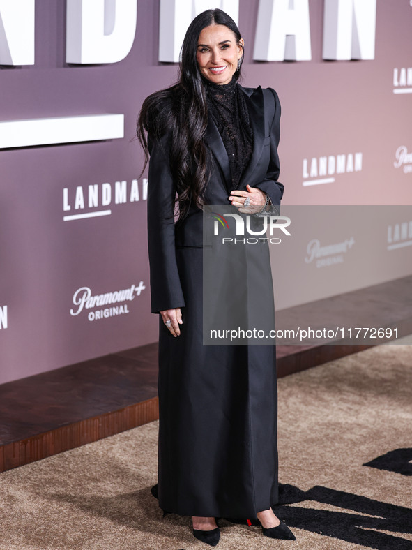 Demi Moore wearing Erdem arrives at the Los Angeles Premiere Of Paramount+'s Original Series 'Landman' Season 1 held at the Paramount Theatr...