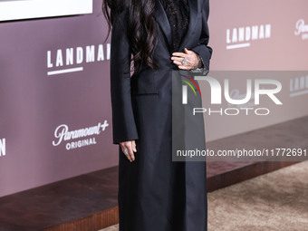 Demi Moore wearing Erdem arrives at the Los Angeles Premiere Of Paramount+'s Original Series 'Landman' Season 1 held at the Paramount Theatr...