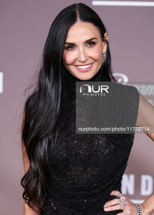 Demi Moore wearing Erdem arrives at the Los Angeles Premiere Of Paramount+'s Original Series 'Landman' Season 1 held at the Paramount Theatr...