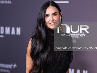 Demi Moore wearing Erdem arrives at the Los Angeles Premiere Of Paramount+'s Original Series 'Landman' Season 1 held at the Paramount Theatr...