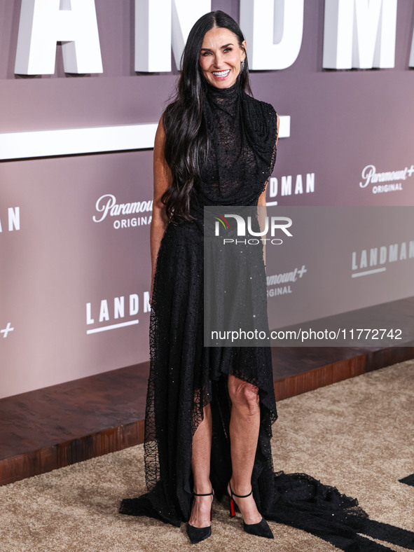 Demi Moore wearing Erdem arrives at the Los Angeles Premiere Of Paramount+'s Original Series 'Landman' Season 1 held at the Paramount Theatr...