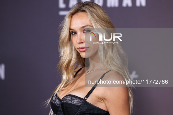 Alexis Ren arrives at the Los Angeles Premiere Of Paramount+'s Original Series 'Landman' Season 1 held at the Paramount Theatre at Paramount...