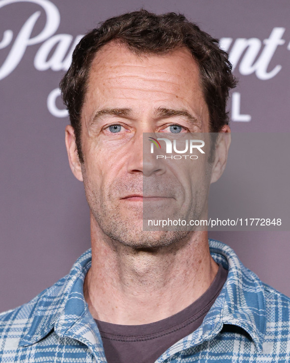 Colin Ferguson arrives at the Los Angeles Premiere Of Paramount+'s Original Series 'Landman' Season 1 held at the Paramount Theatre at Param...