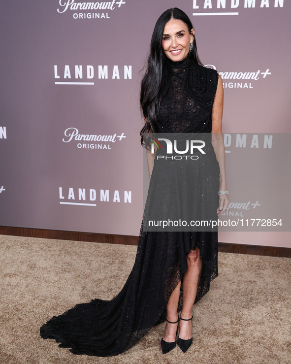 Demi Moore wearing Erdem arrives at the Los Angeles Premiere Of Paramount+'s Original Series 'Landman' Season 1 held at the Paramount Theatr...