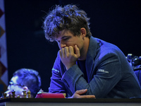 India's chess grandmaster Rameshbabu Praggnanandhaa and five-time world chess champion Magnus Carlsen of Norway face off in a rapid round of...