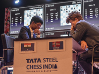 India's chess grandmaster Rameshbabu Praggnanandhaa and five-time world chess champion Magnus Carlsen of Norway face off in a rapid round of...