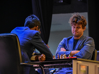 India's chess grandmaster Rameshbabu Praggnanandhaa and five-time world chess champion Magnus Carlsen of Norway face off in a rapid round of...